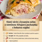 Slaný závin s kysaným zelím a uzeninou na talíři