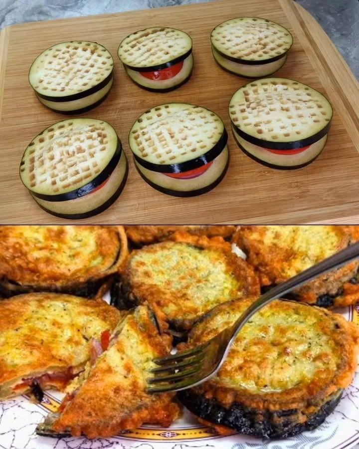Uvařené baklažány na talíři s bylinkami a olivovým olejem